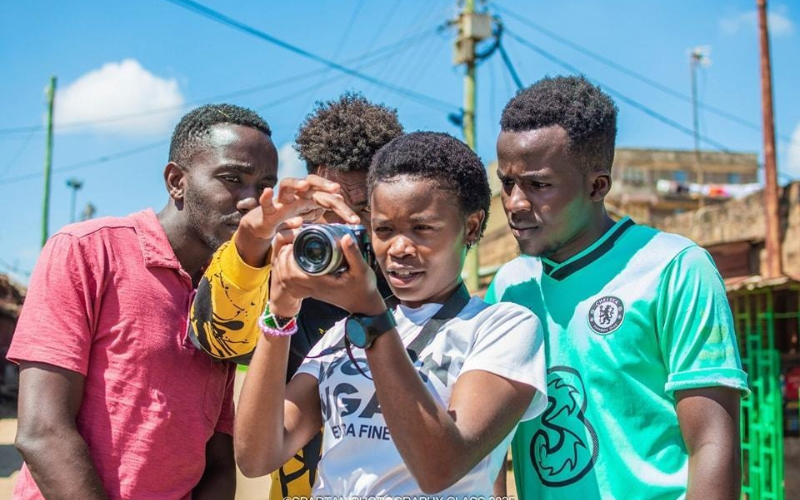 Young photographers learning composition in Nairobi